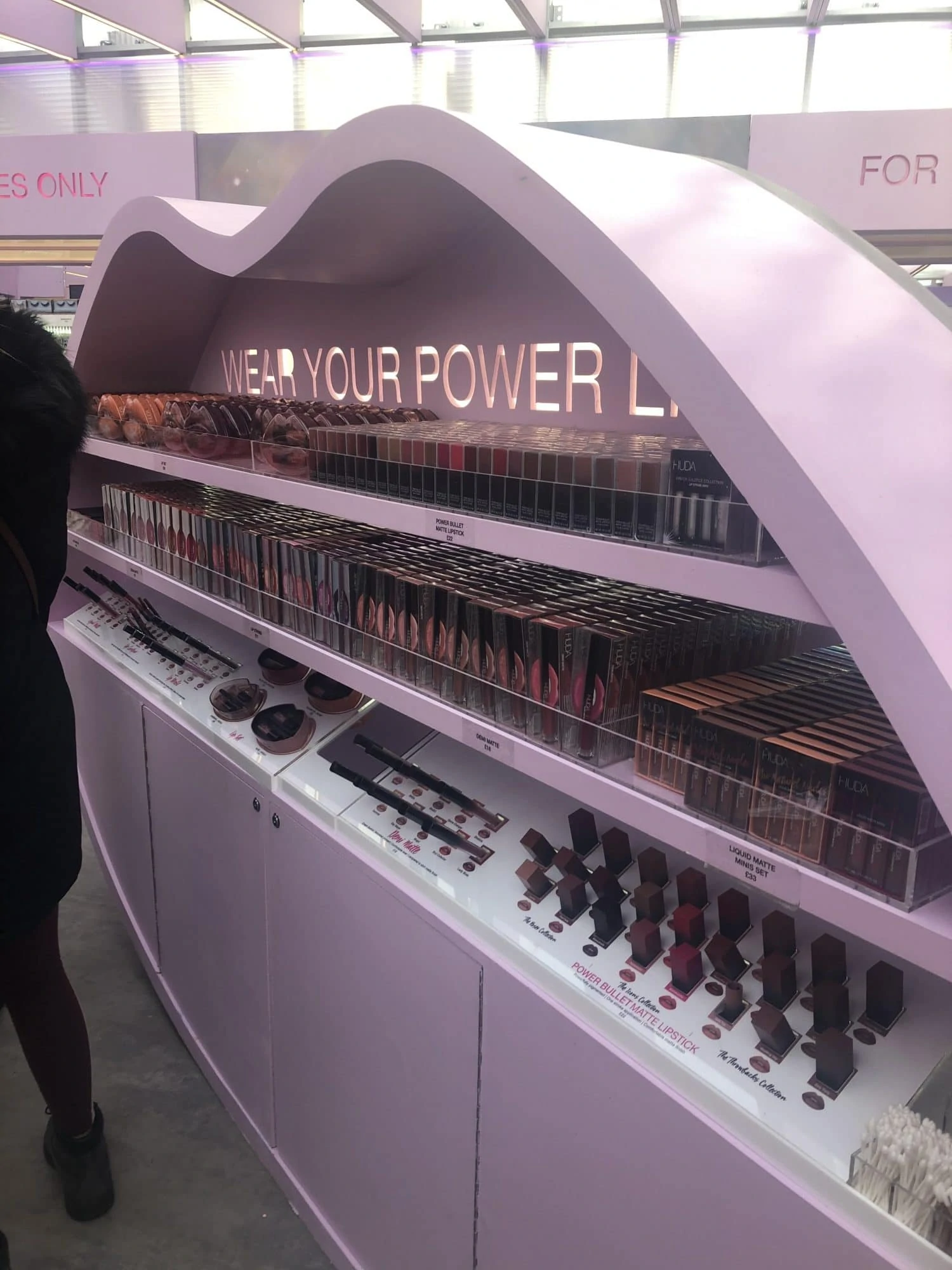 Glossier lipstick in pop-up store
